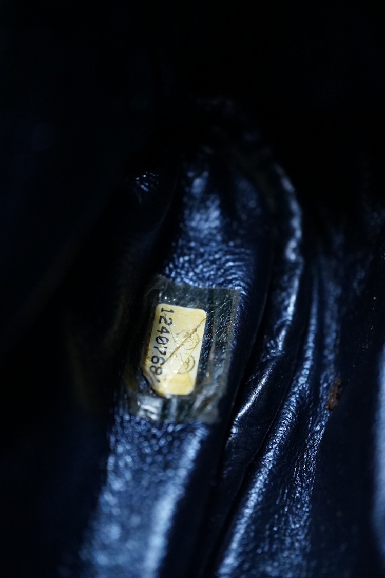 A Chanel metallic 2.55 re-issue quilted camera bag, date code 12407681, 35cm wide